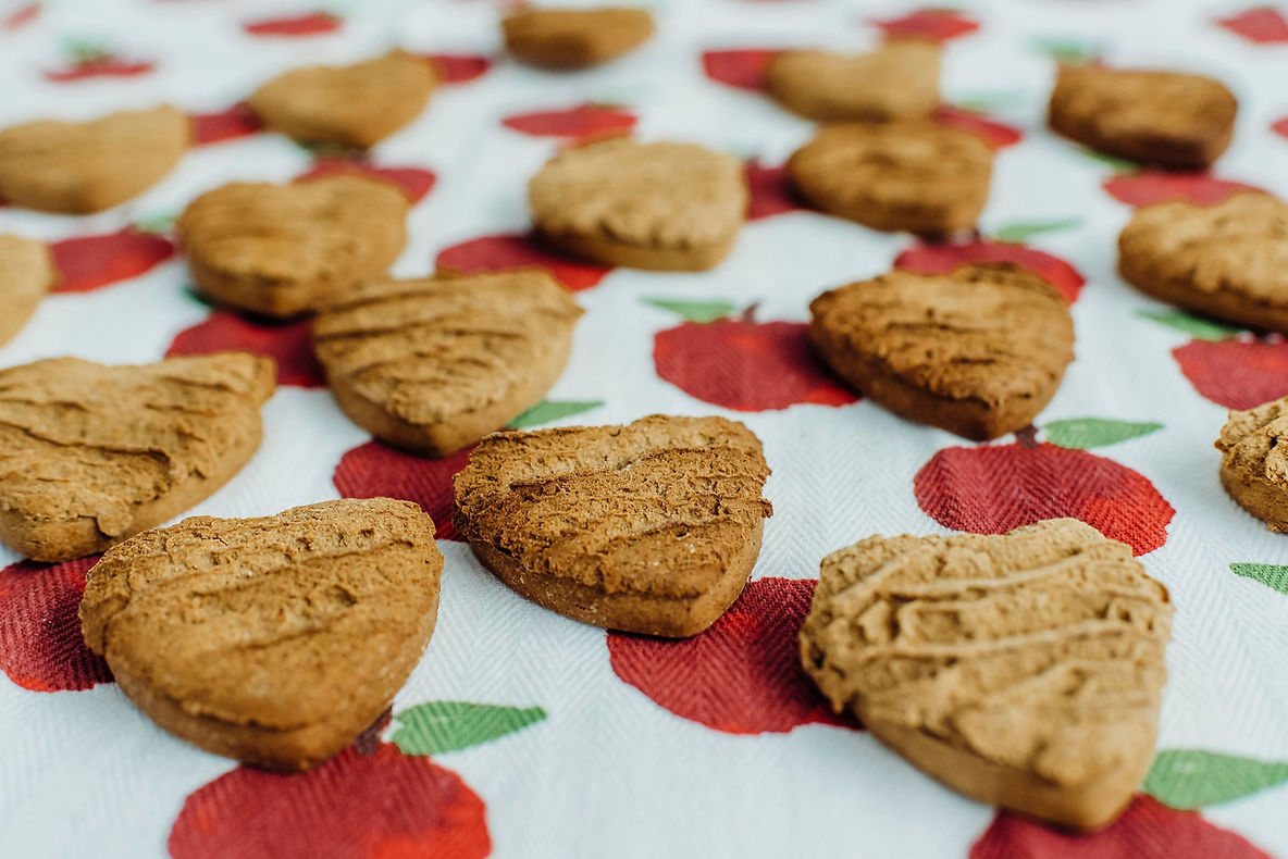Suzie's CBD Hearts on an apple tablecloth.