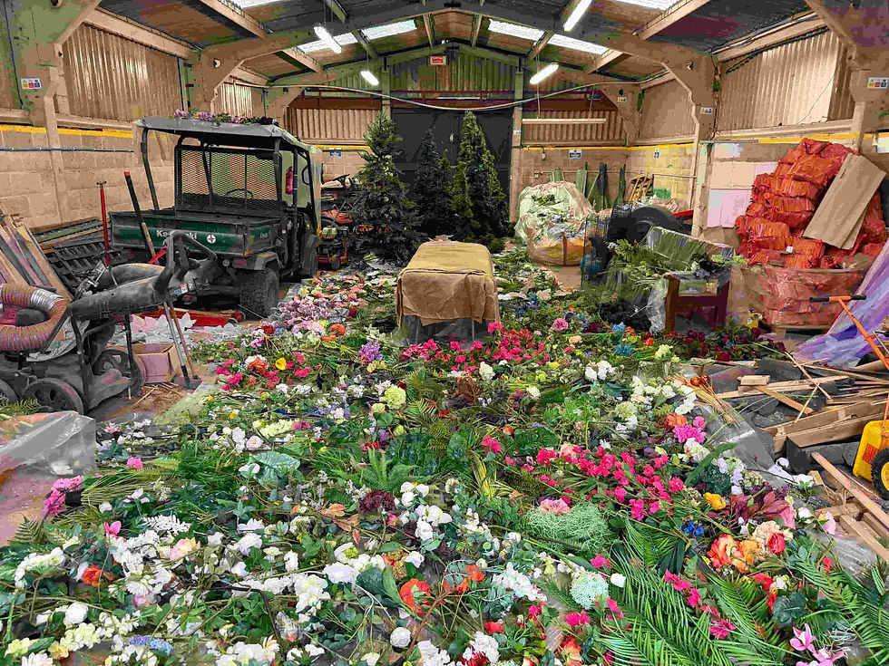 Fire retardant treatment being applied to artificial plants for venue compliance.