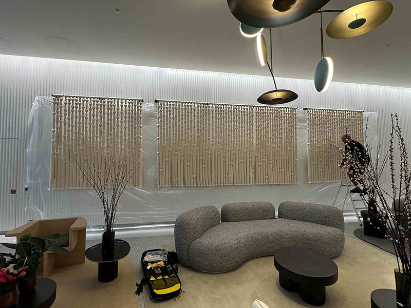 Fireproofing technician treating retail display with fire retardant.jpg