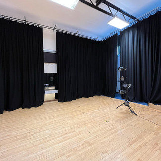 Drama room black wool curtains cleaned and fireproofed