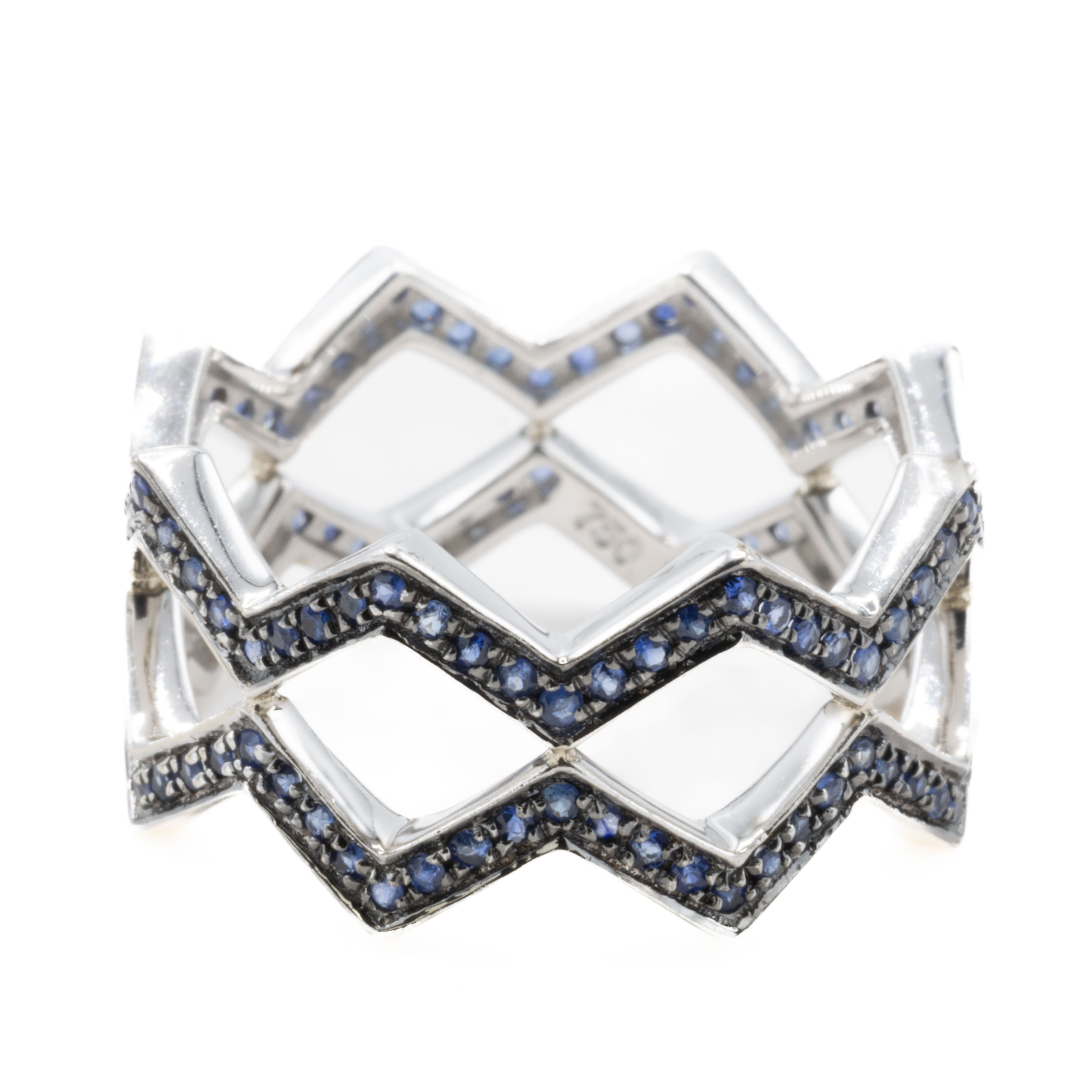 Zigzag ring with blue stones on white background, Ofira Jewels.