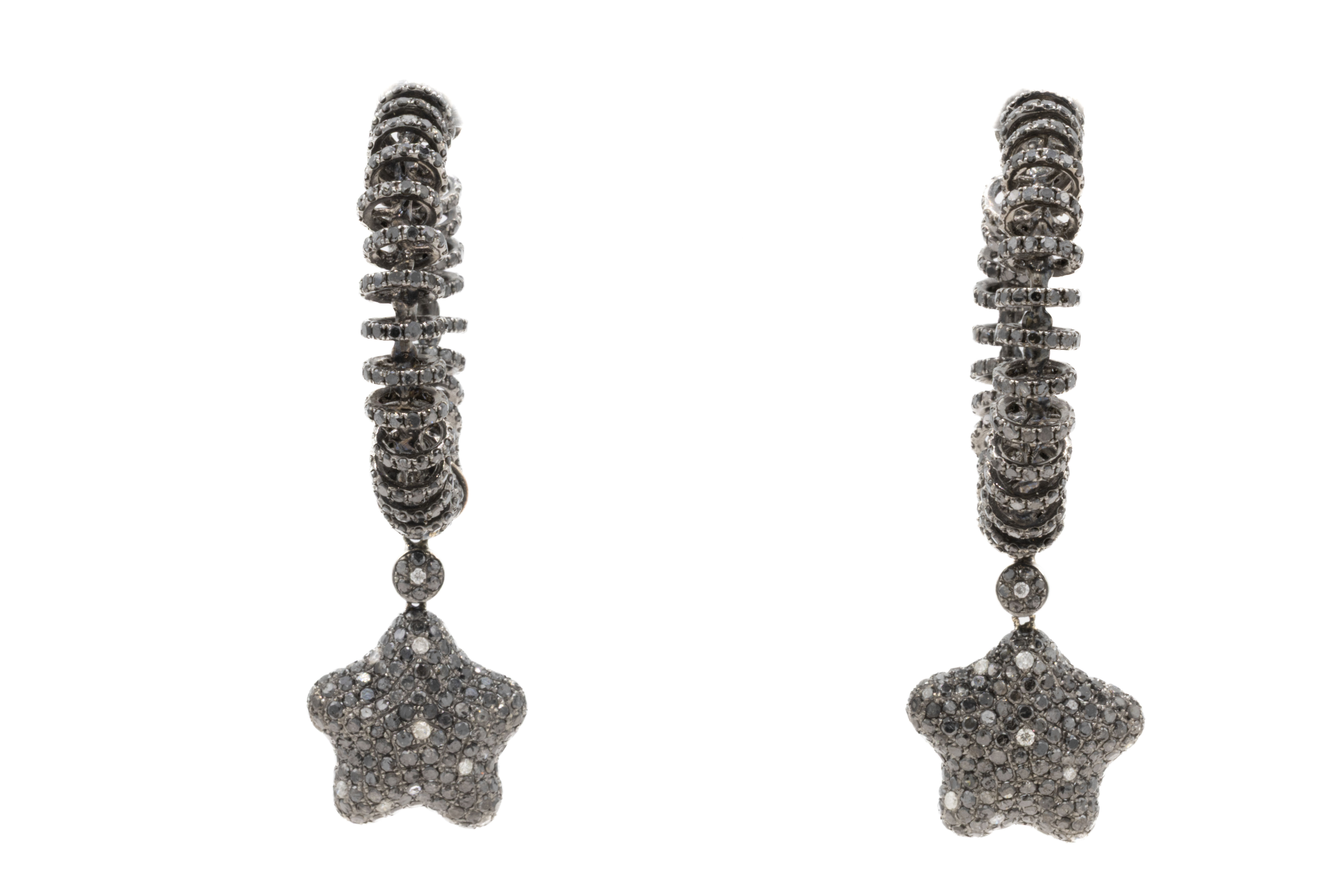 Star-shaped dangle earrings with a hoop and textured metal Ofira Jewels.