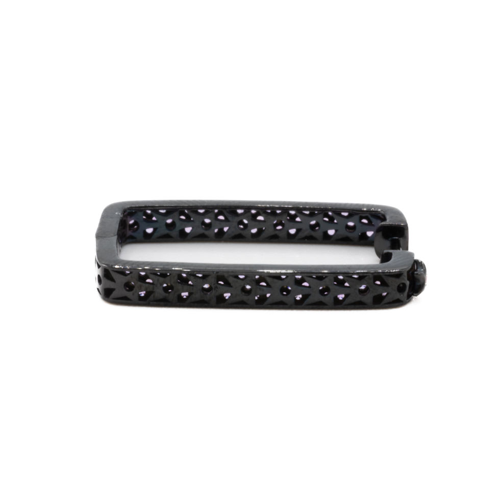 Black stone ring with openwork design, elegant jewelry for sale.