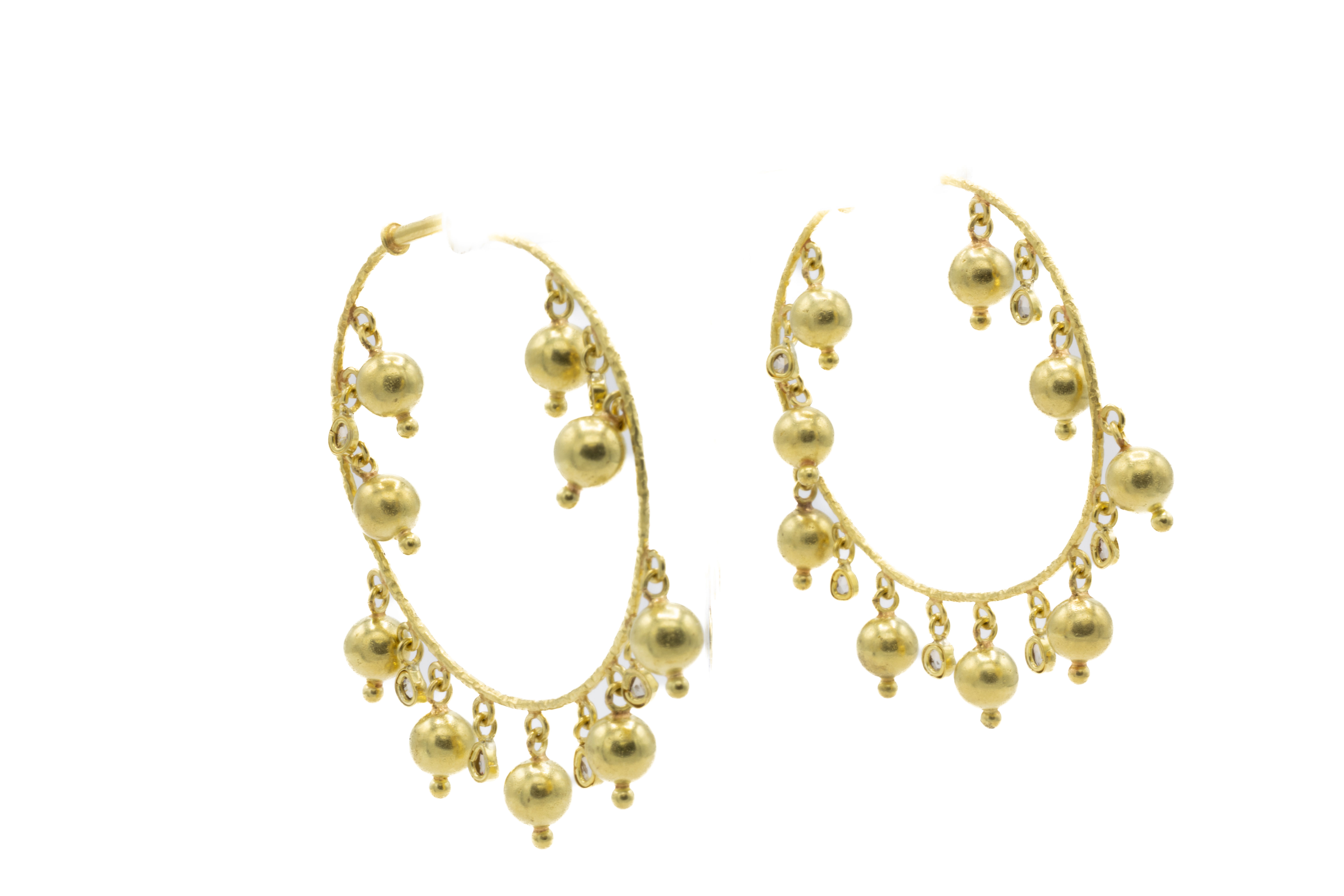 Gold hoop earrings with dangling beads, isolated on white background. Ofira Jewels.