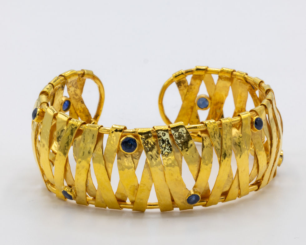 Miniature : Gold bracelet with blue gems, detailed design, and textured surface Ofira Jewels