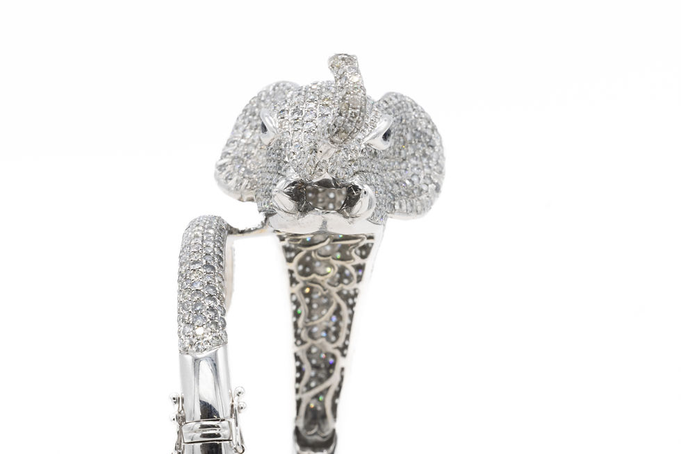 Thumbnail: Diamond elephant cuff bracelet with intricate detailing on white background, Ofira Jewels