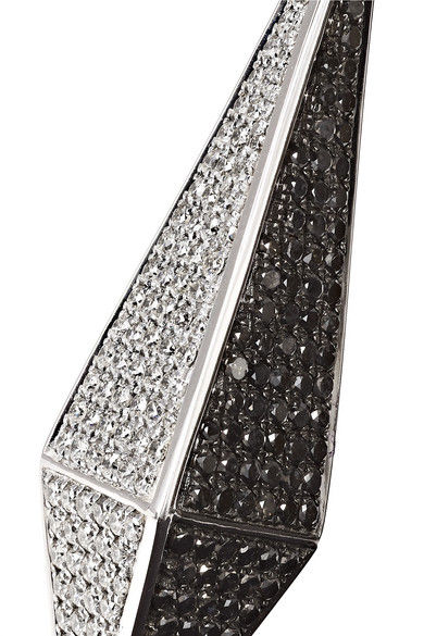 Close-up of striking black and white diamond earrings, Ofira Jewels.