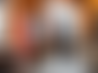 Two people using a colorful smart vending machine in a modern café setting, representing Vendekin’s customizable vending solutions for diverse business environments.