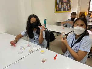 In Thai Culture lessons, students learn and enjoy how to make gel candles