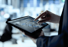 solar-panels-plant-employee-analyzing-performance-data-tablet-close-up (1).png