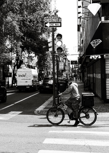 Biker navigating Downtown Philly