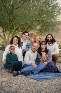 grand parents, parents, and grand kids sitting in the desert in las vegas nevada