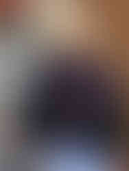 Murrieta Valley HS Senior wearing her letterman jacket on campus in Murrieta, CA