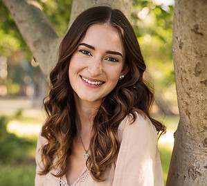 menifee california high school senior smiling in a park