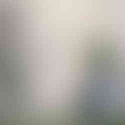 Murrieta Mesa Football player standing by wall