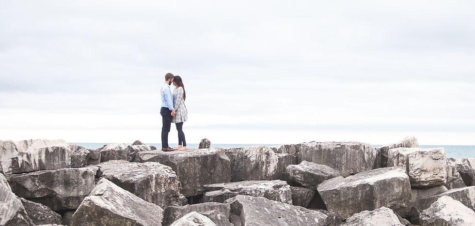 Lovers on a Rocky Beach
