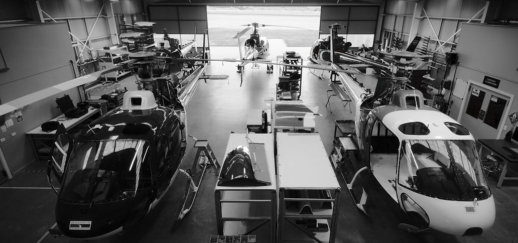 Helicopters parked in hanger.jpg