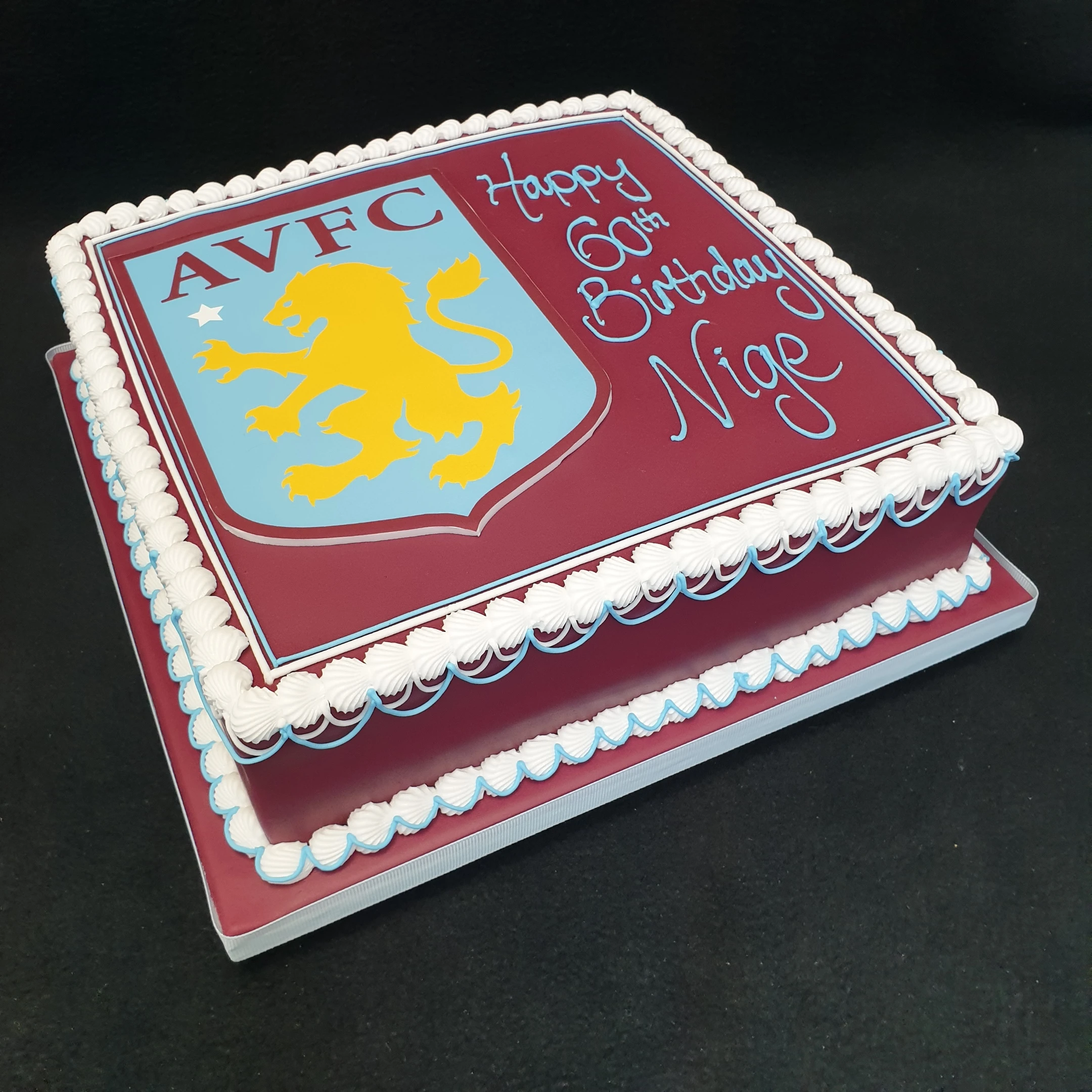 Aston Villa badge themed cake with intricate detailing and vibrant colours, perfect for die-hard football fans.