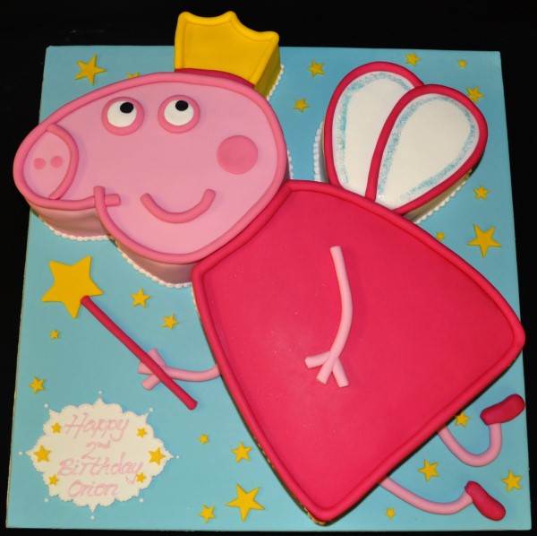 Bespoke Peppa Pig princess-themed cake with pink icing and crown details, crafted in Solihull, West Midlands.