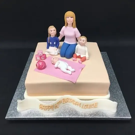 Bespoke FAMILY celebration cake with colorful fondant letters on white icing, Solihull, West Midlands.