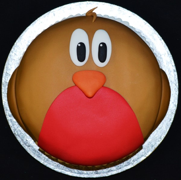 Bespoke Robin Christmas cake with festive holly and berries decoration, Solihull, West Midlands.