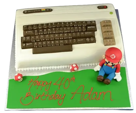 Bespoke Commodore 64 cake featuring Super Mario design, crafted for celebration in Solihull, West Midlands.