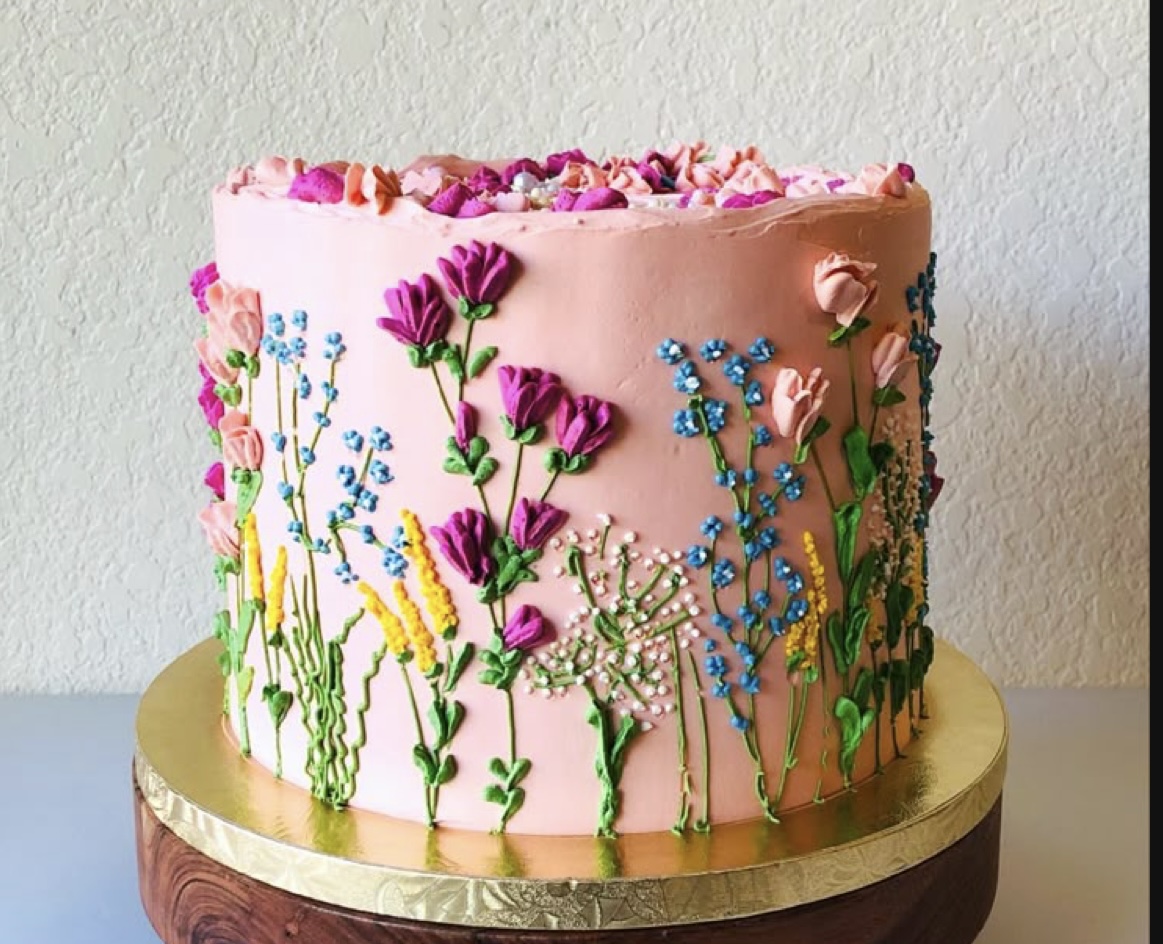 Personalised birthday cake with vibrant decorations and elegant design, perfect for celebrating someone special.