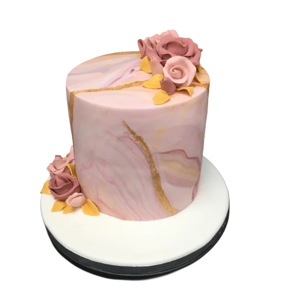 A stunning marble-patterned cake adorned with delicate sugar roses for elegant celebrations and events.