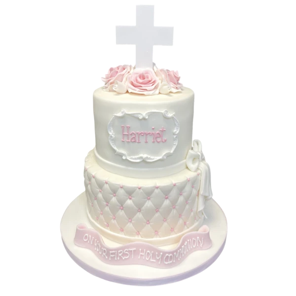 A beautifully decorated Holy Communion/Christening cake with intricate detailing. Perfect for celebrating a special religious occasion.