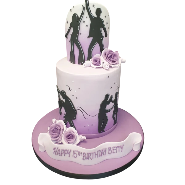 Bespoke cake featuring dancing figures and vibrant decorations, crafted in Solihull, West Midlands.