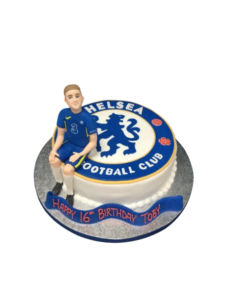 A beautifully decorated Chelsea Football Badge cake featuring the iconic team logo and colors, perfect for football fans and celebrations.
