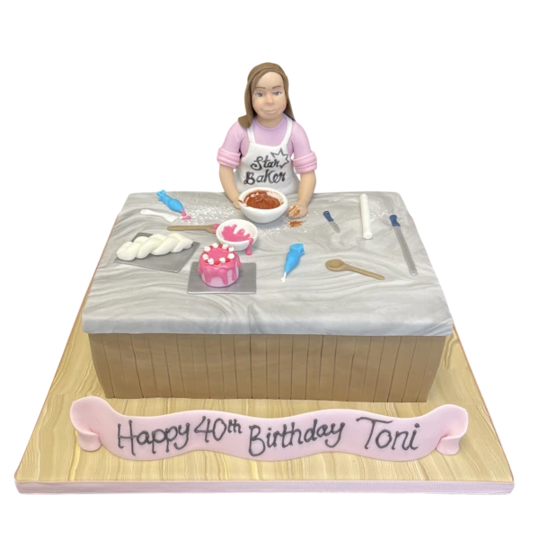 Bespoke celebration cake with intricate floral piping and pastel colors, crafted in Solihull, West Midlands.