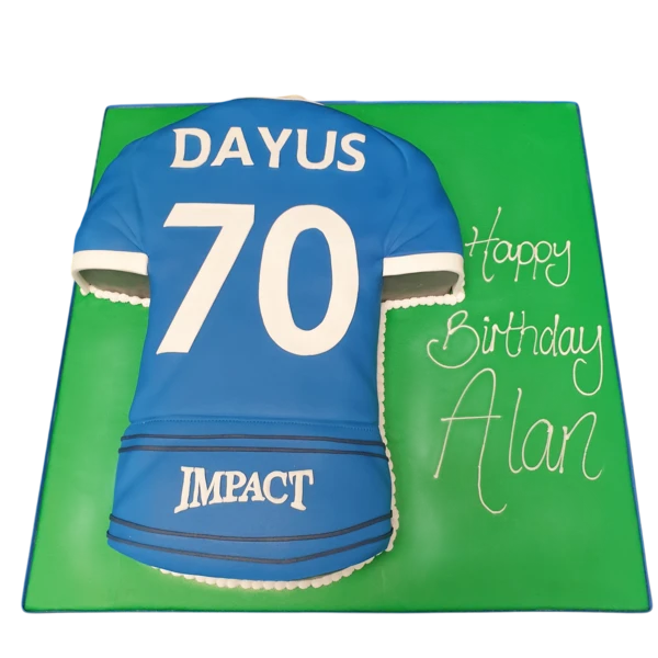 A customisable football shirt cake perfect for sports fans. Brightly decorated in team colours, this cake is a unique and fun choice for any celebration.