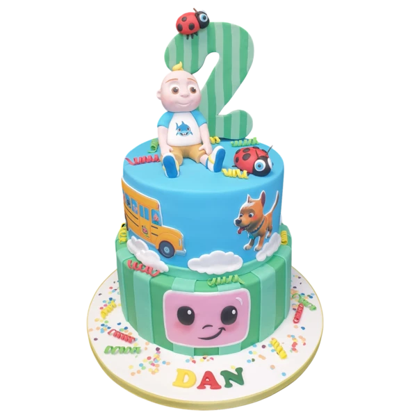 A beautifully designed and artistic Coco Melon themed cake with vibrant colours and intricate details, perfect for a themed celebration.