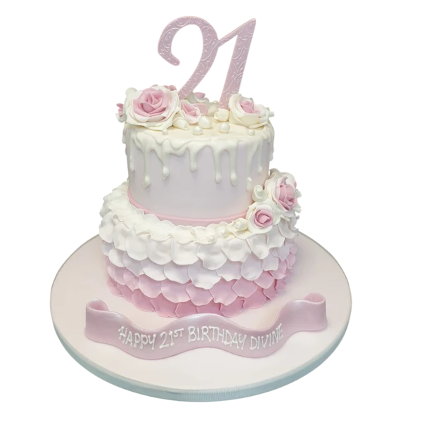 Bespoke celebration cake with pink rose petals and intricate floral detailing, Solihull, West Midlands.