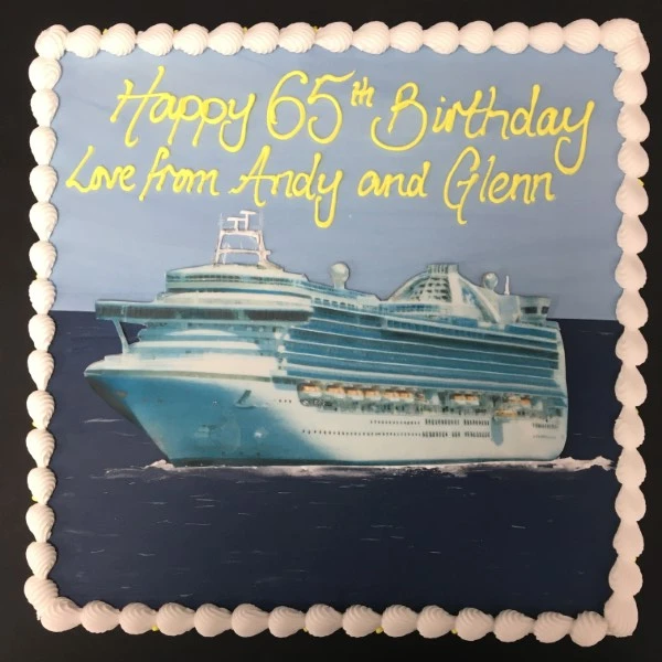 Bespoke cruise ship cake with detailed decks and lifeboats, crafted for celebration in Solihull, West Midlands.