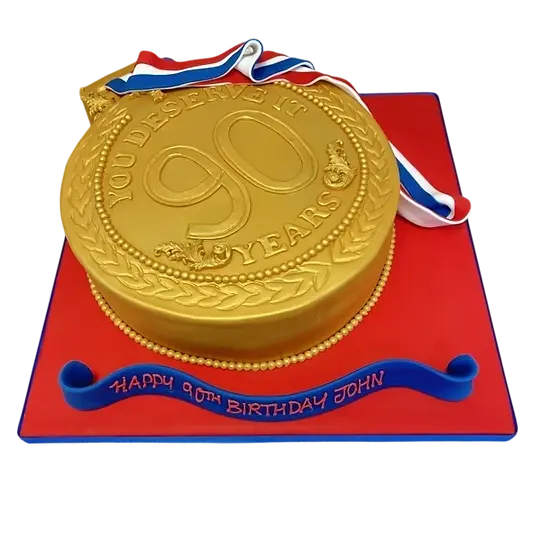 Gold Medal bespoke celebration cake with gold accents and intricate detailing in Solihull, West Midlands.