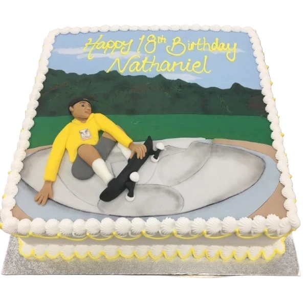 Bespoke skate park cake with edible ramps and skateboard decorations, crafted in Solihull, West Midlands.