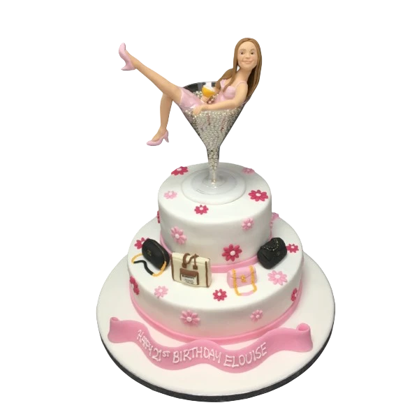 Bespoke celebration cake featuring two martini glass-shaped figures, crafted in Solihull, West Midlands.