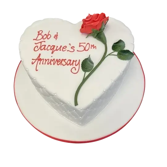 Bespoke cake featuring a red rose and stem on a quilted heart design in Solihull, West Midlands.