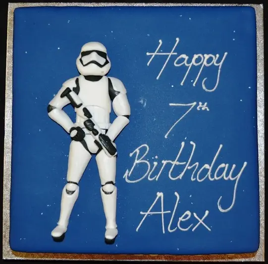 Bespoke Stormtrooper cake with detailed helmet design for celebration in Solihull, West Midlands.