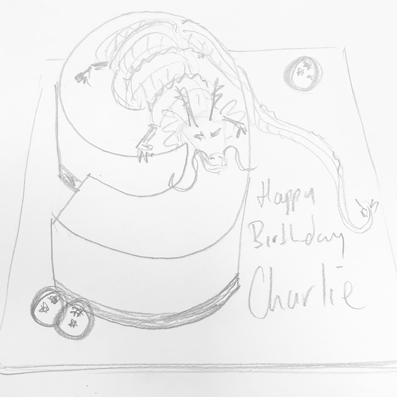 Bespoke celebration cake with intricate floral icing and gold accents in Solihull, West Midlands.