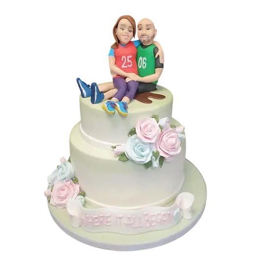 Bespoke three-tier celebration cake with pastel blue fondant and white floral accents in Solihull, West Midlands.