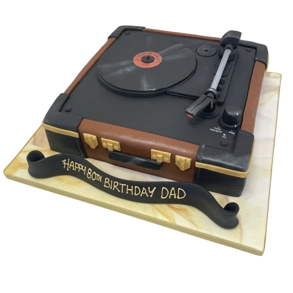 Modern and stylish leather record player themed cake with intricate details, perfect for music lovers and special celebrations.