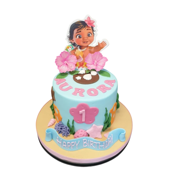 Bespoke Baby Moana cake featuring a detailed fondant figure, tropical decorations, in Solihull, West Midlands.