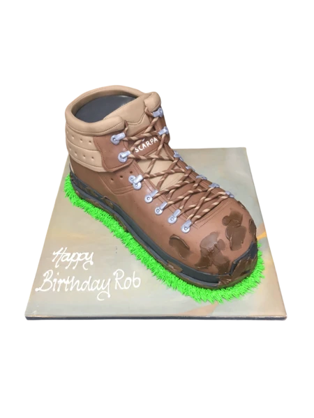 Bespoke celebration cake with intricate floral designs and gold accents, crafted in Solihull, West Midlands.