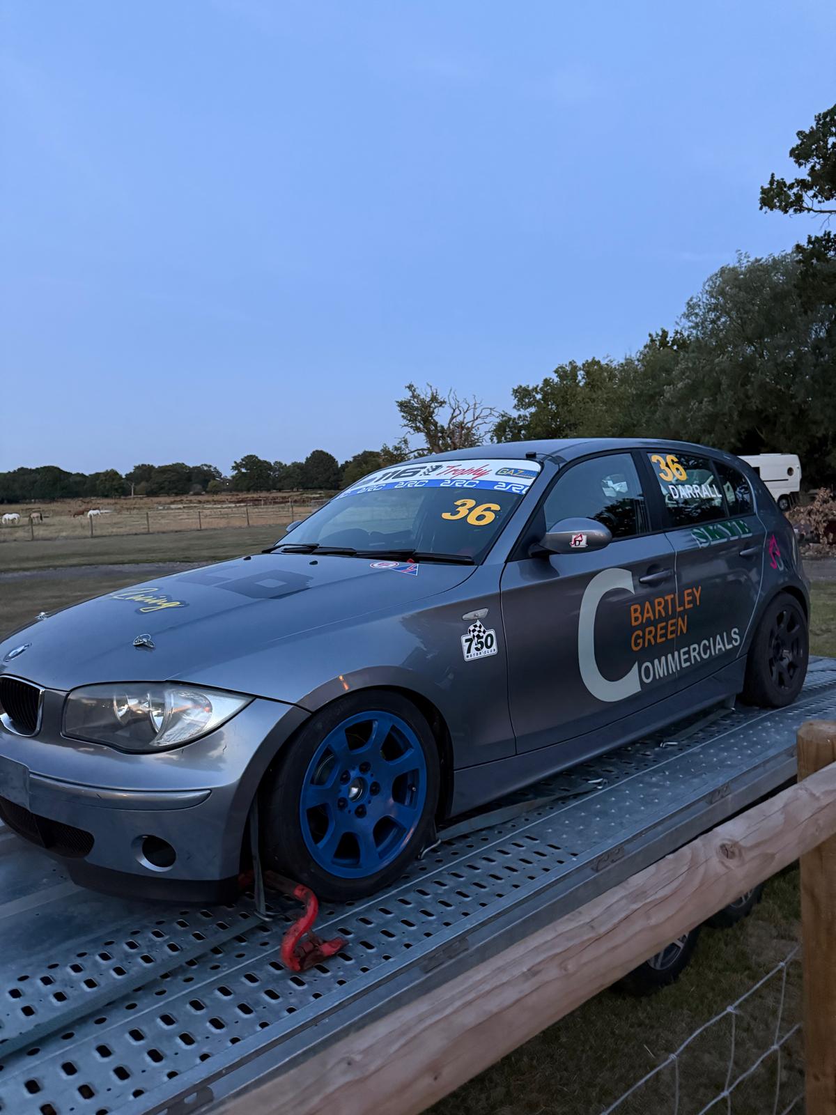 Bespoke cake with elegant white icing and delicate floral decorations for celebration in Solihull, West Midlands.