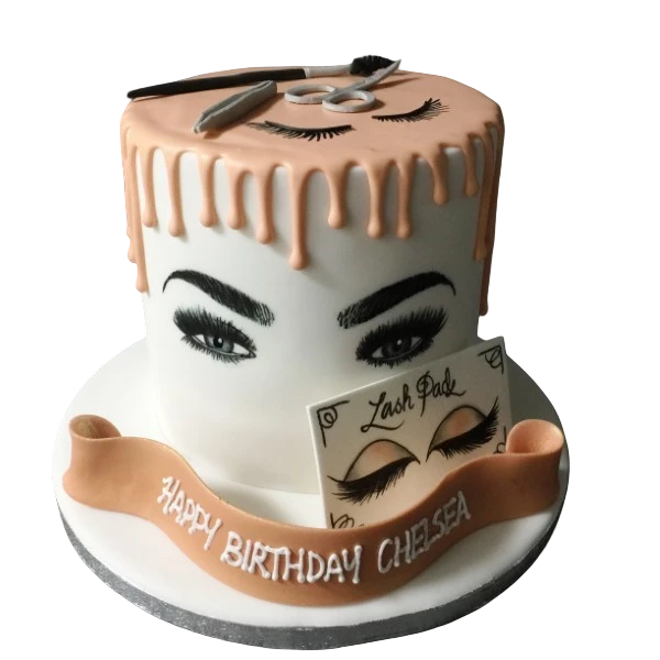 Bespoke celebration cake with black eyelash decorations and glossy chocolate drips in Solihull, West Midlands.