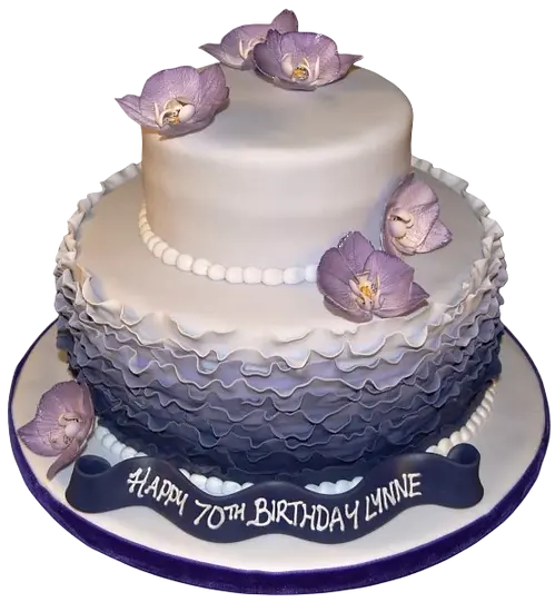 Bespoke celebration cake with frills, ruffles, and delicate orchid decorations in Solihull, West Midlands.