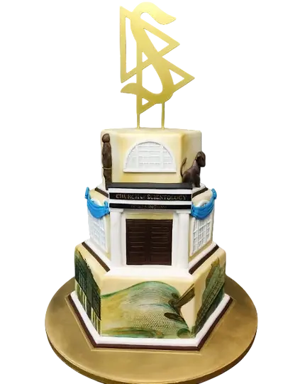 Bespoke Scientology-themed cake with intricate symbols and lettering, crafted in Solihull, West Midlands.